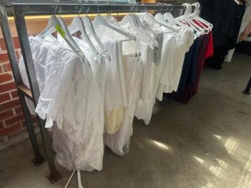 DESCRIPTION CONTENTS OF RACK (12) ASSORTED TABLE CLOTHES AND SKIRTS. THIS LOT IS: ONE MONEY LOCATION FLOOR 8 QTY 1