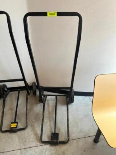 DESCRIPTION STACK CHAIR DOLLY ADDITIONAL INFORMATION IF YOU NEED A DOLLY TO MOVE YOUR CHAIRS IT IS RECOMMEND TO BUY ONE AT AUCTION. WE CANNOT LOAN THE