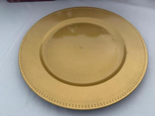 DESCRIPTION (48) 13" GOLD PLASTIC CHARGER BRAND / MODEL: CELEBRATE IT THIS LOT IS: SOLD BY THE PIECE SIZE 13" LOCATION FLOOR 7 QTY 48